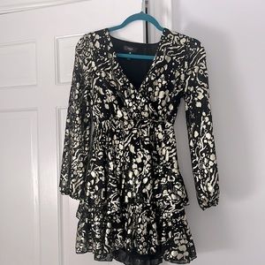 Dress purchased from bloomingdale’s by the brand Aqua. It was worn only once.